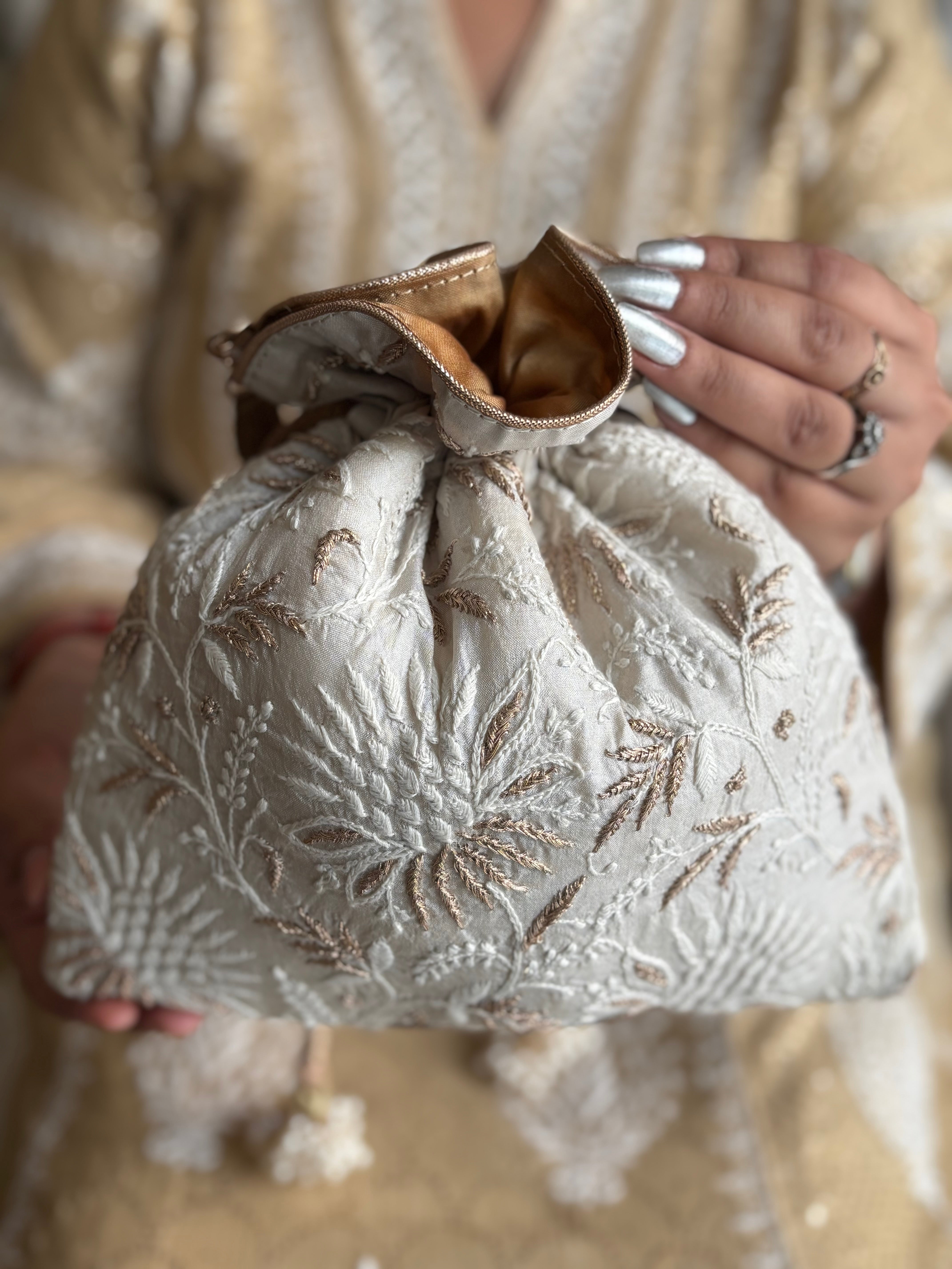 Ivory Silk Chikankari Potli
