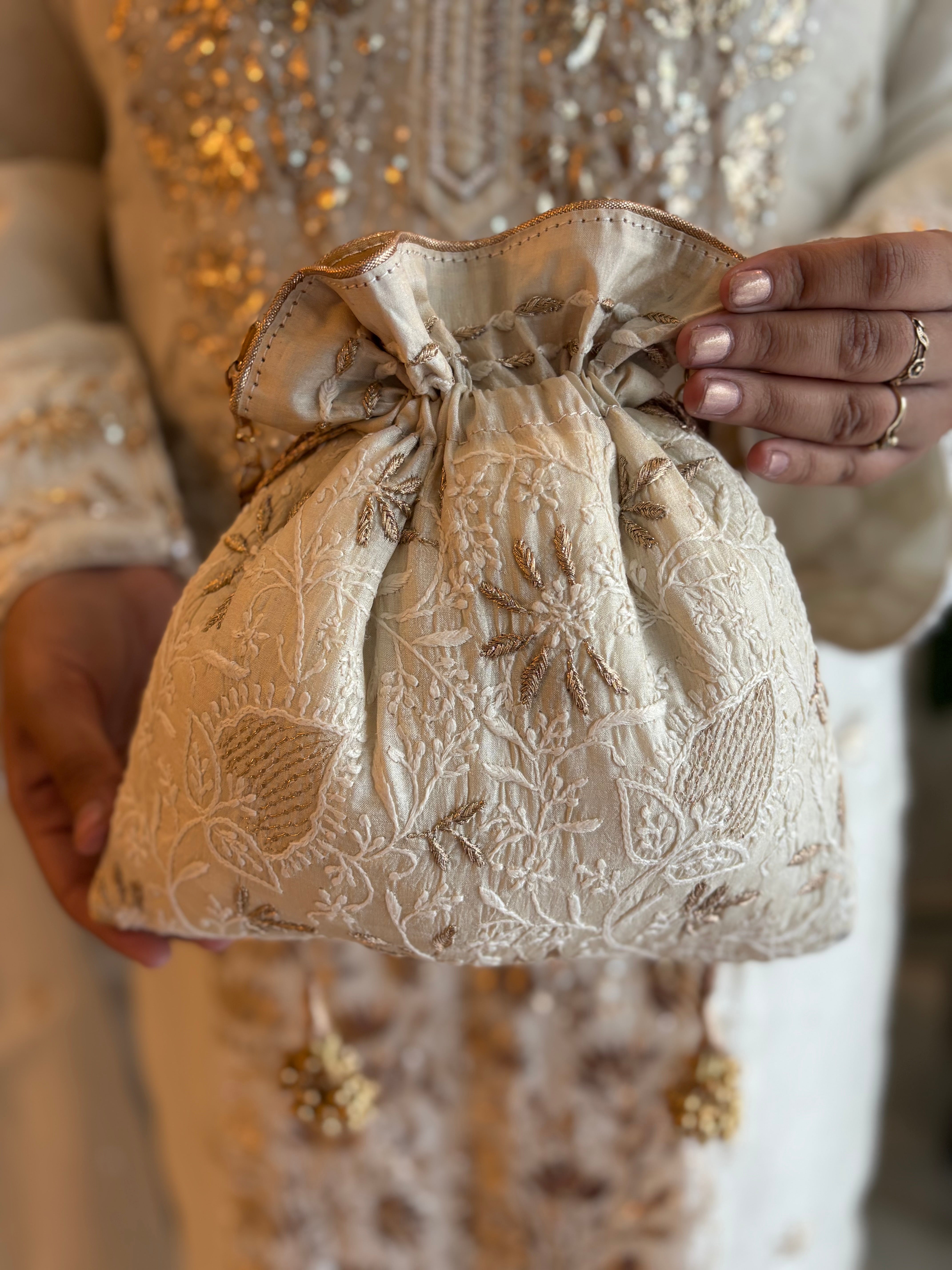 Ivory Silk Chikankari Potli